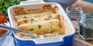 Leek 'cannelloni' gratin with chicken, apple, and Caerphilly cheese sauce