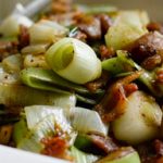 Leeks Tossed in Butter with Chestnuts, Black Pepper and Streaky Bacon