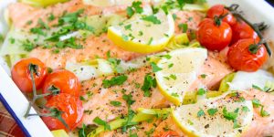 Baked salmon on a bed of leeks